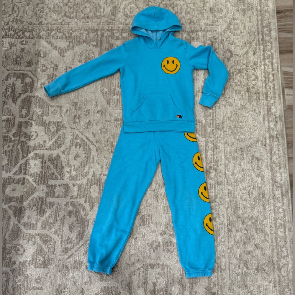 Aviator Nation Blue and Yellow One Piece with Vibrant Design